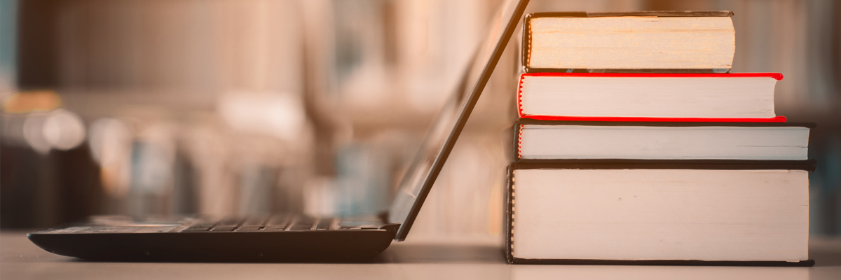 laptop and books