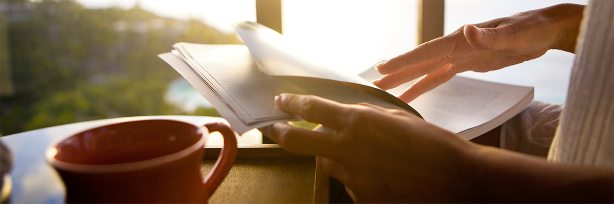 young women reading a book