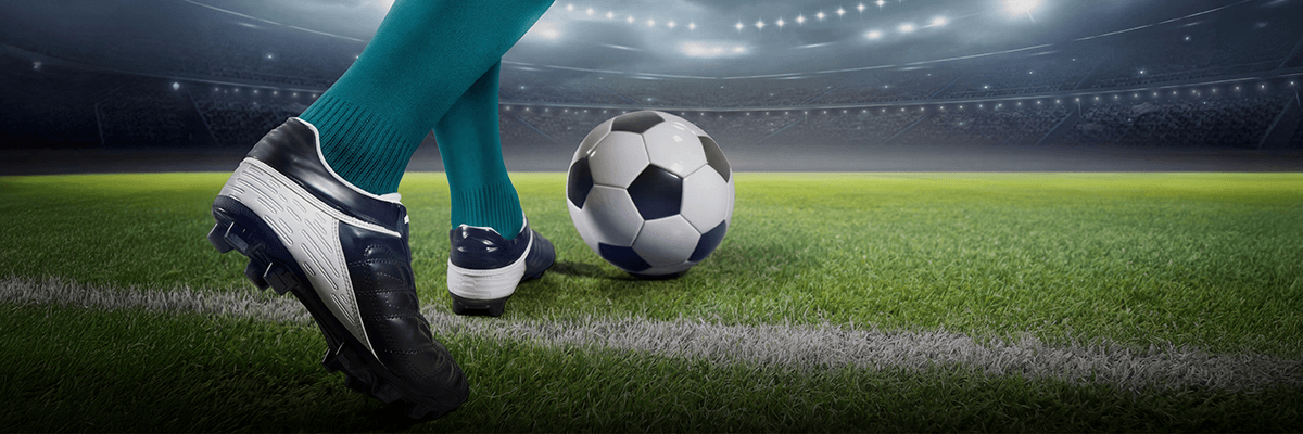 kicking a soccer ball