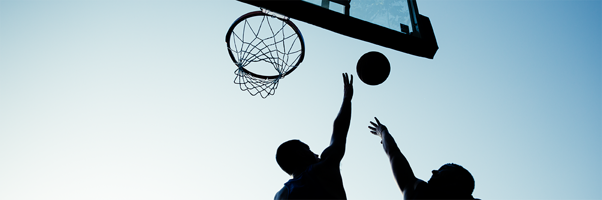 men playing basketball